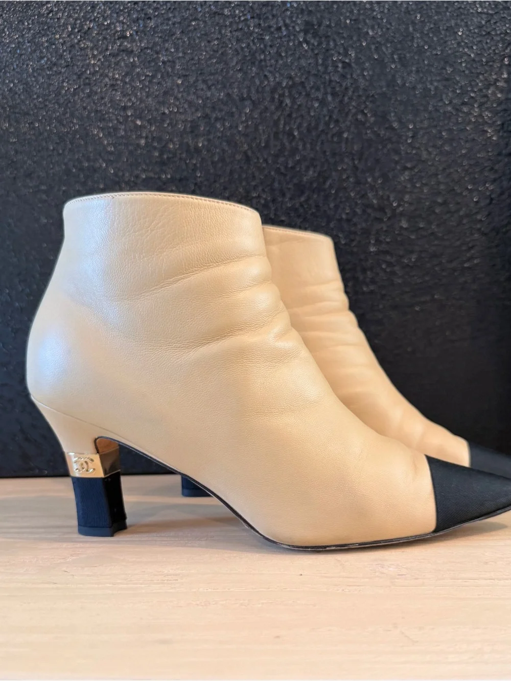 CHANEL Beige Leather Ankle Boots with Black Cap Toe